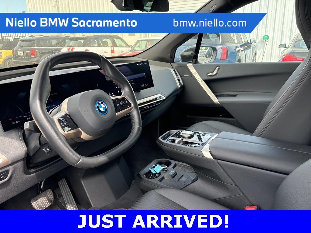 used 2024 BMW iX car, priced at $64,694