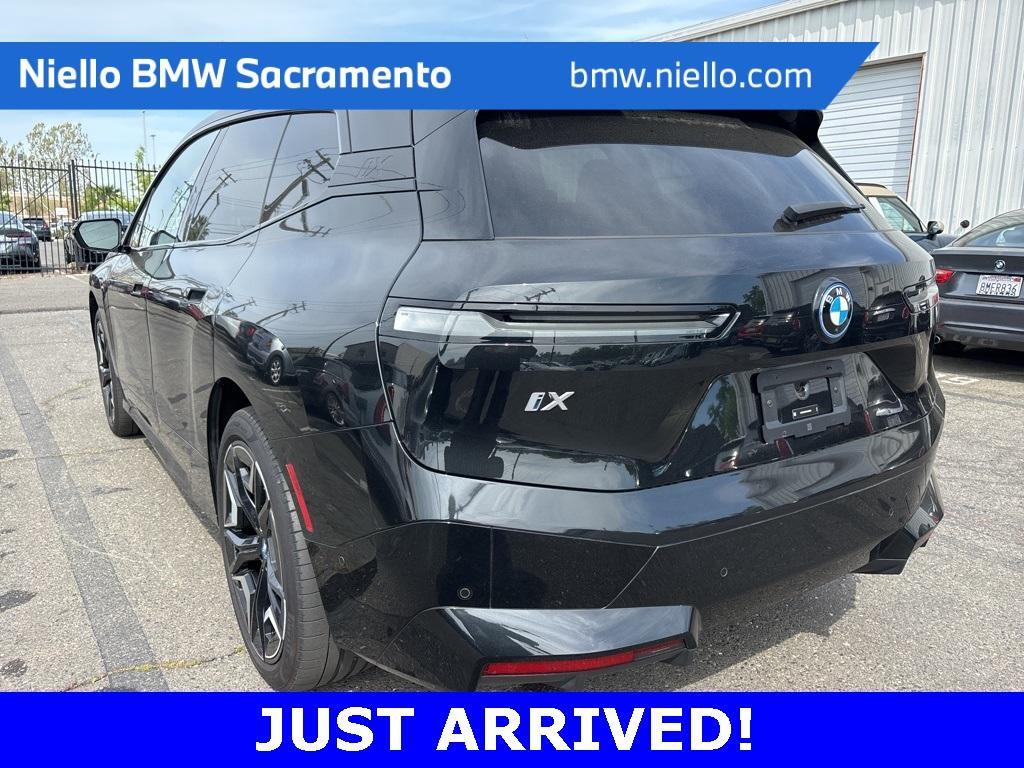 used 2024 BMW iX car, priced at $64,694