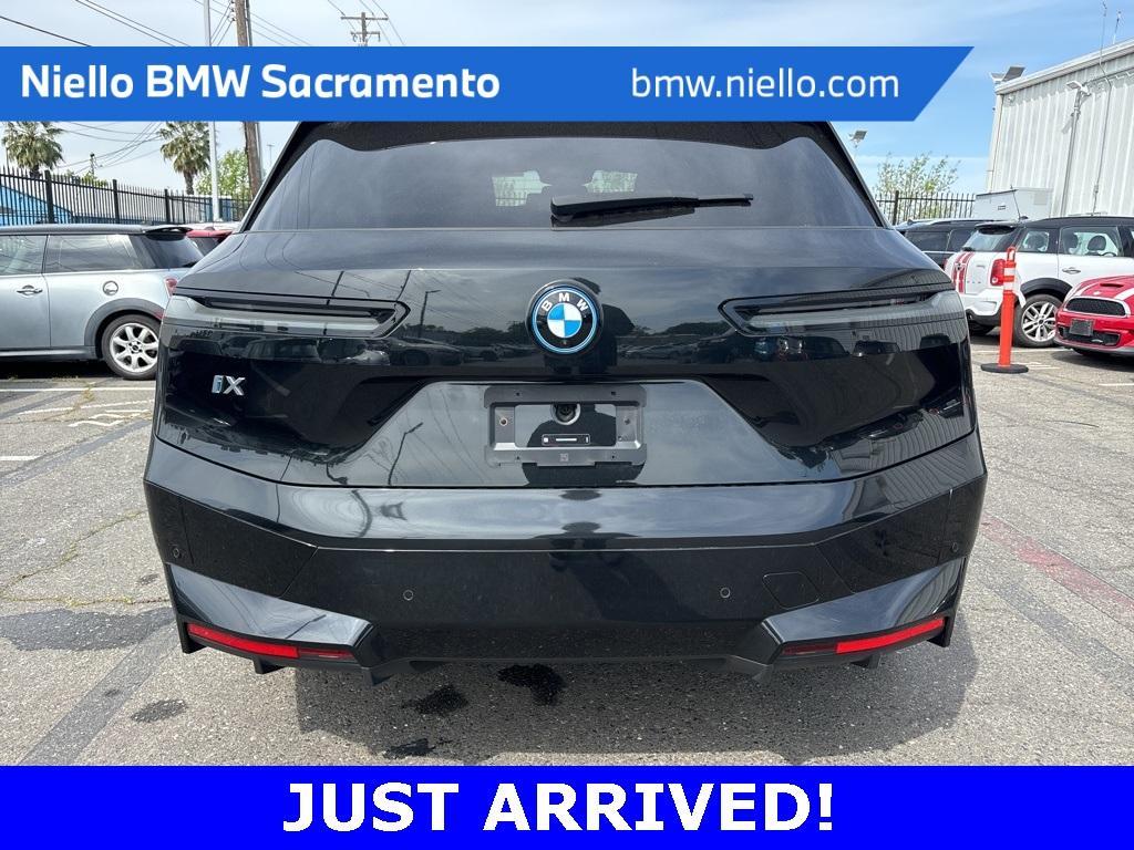 used 2024 BMW iX car, priced at $64,694