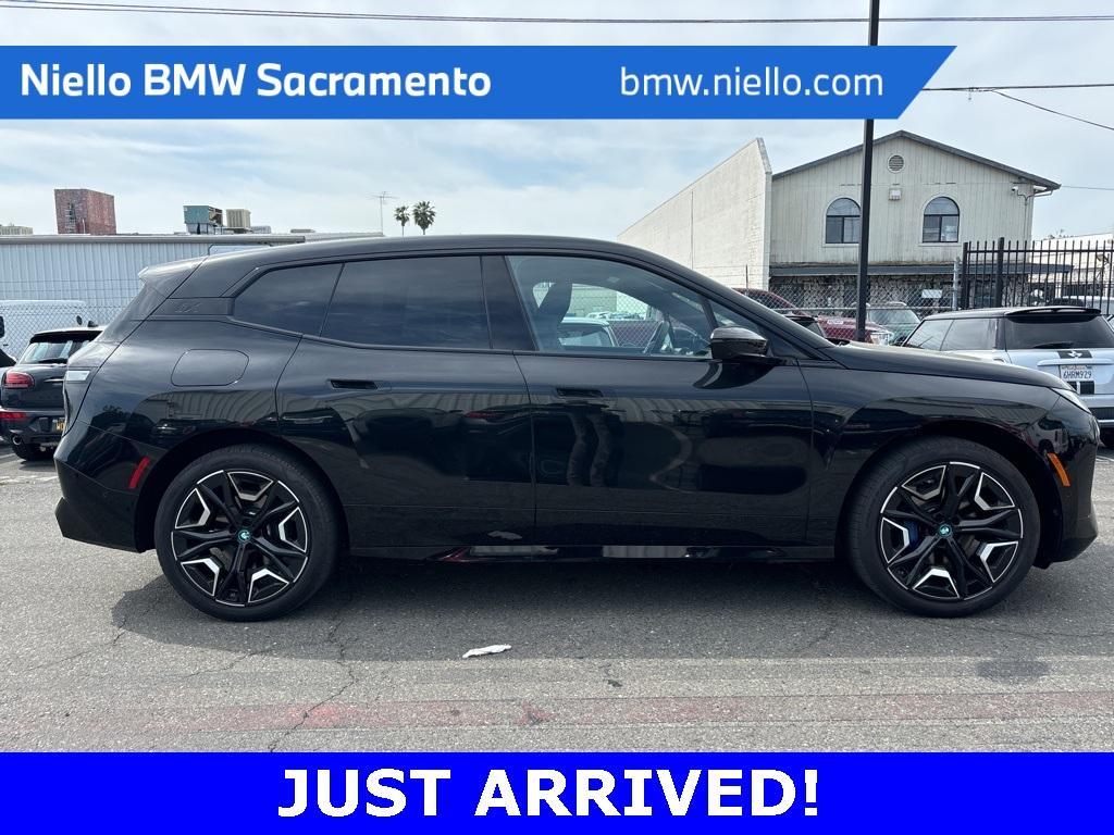 used 2024 BMW iX car, priced at $64,694