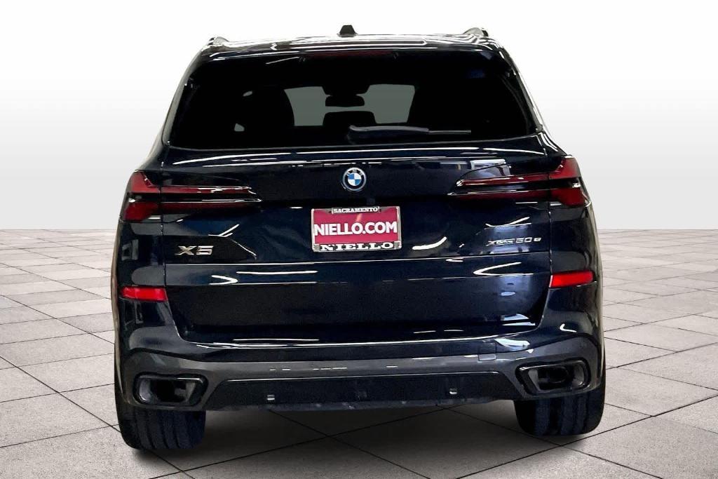 used 2025 BMW X5 PHEV car, priced at $73,993