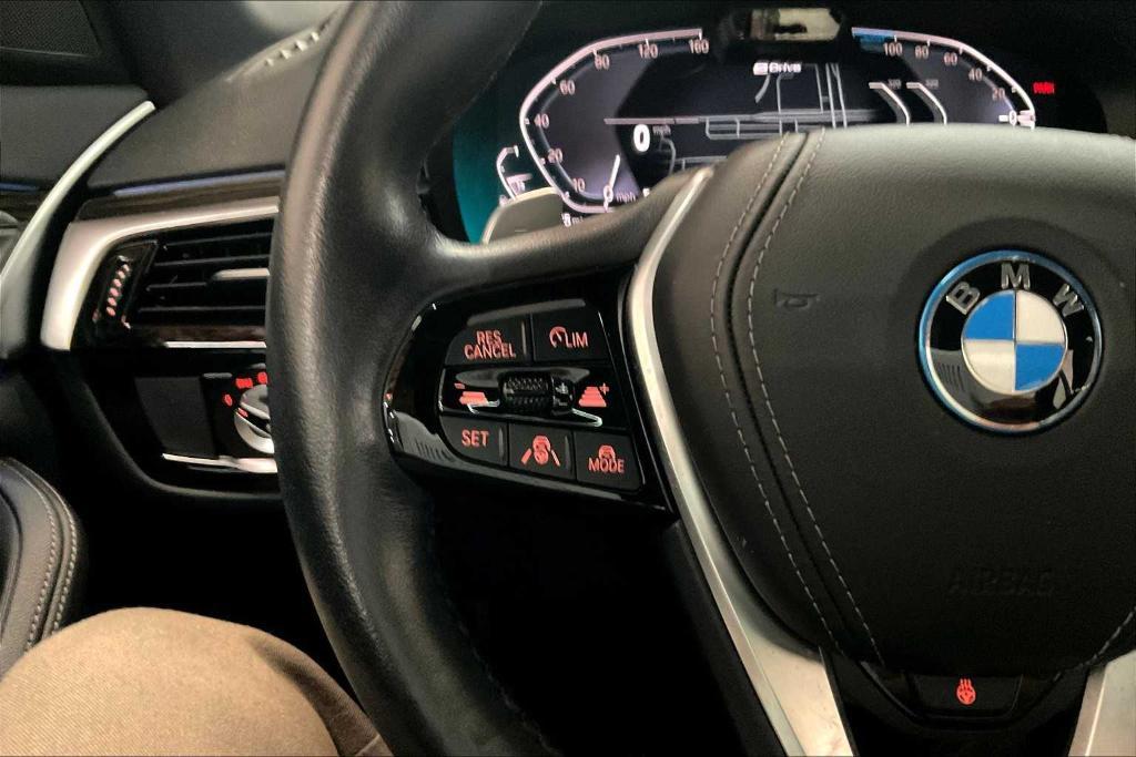 used 2023 BMW 530e car, priced at $39,293