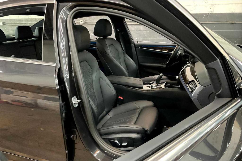 used 2023 BMW 530e car, priced at $39,293