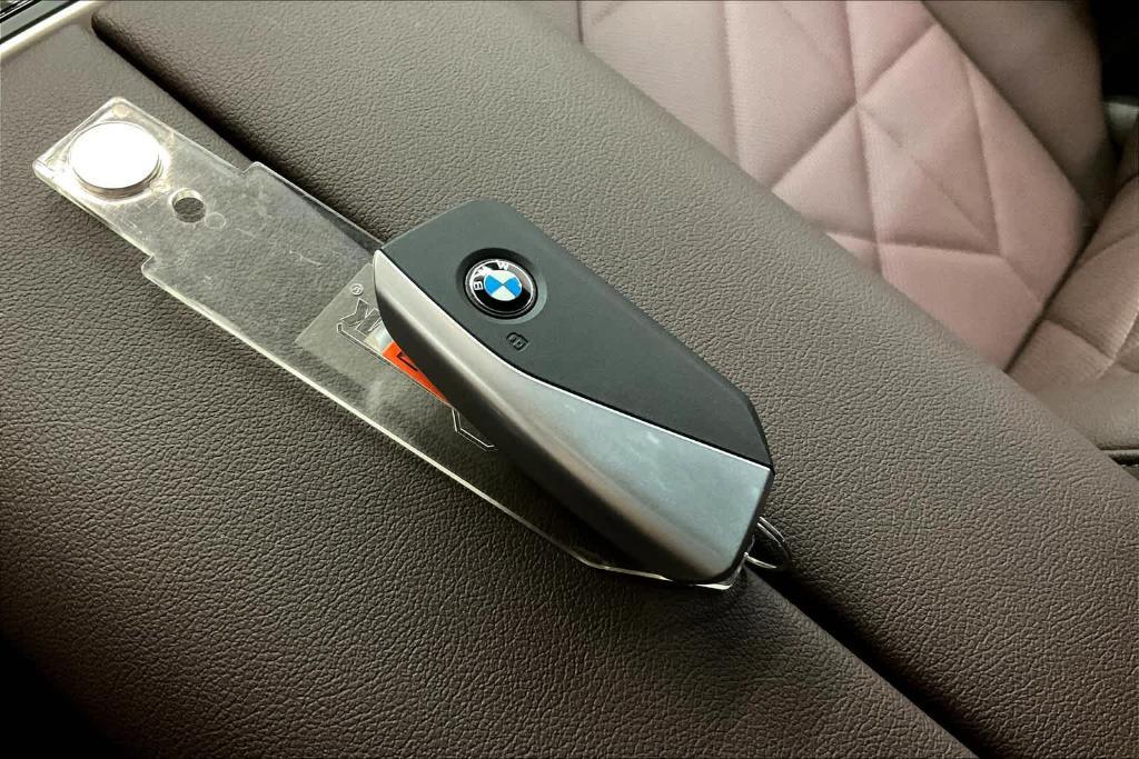 new 2025 BMW iX car, priced at $88,998