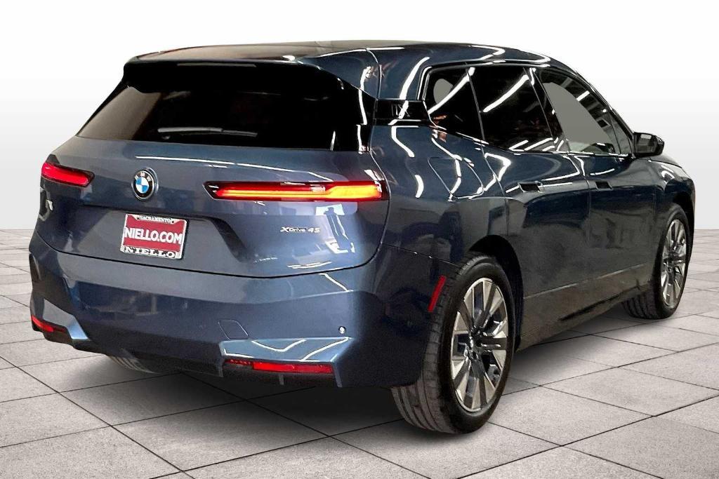 new 2026 BMW iX car, priced at $82,470