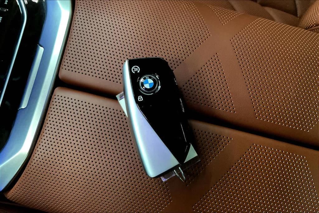 used 2024 BMW 750e car, priced at $81,991
