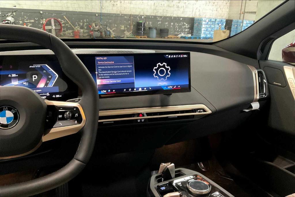 new 2026 BMW iX car, priced at $97,775