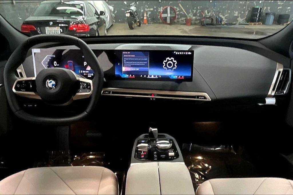 new 2026 BMW iX car, priced at $97,775