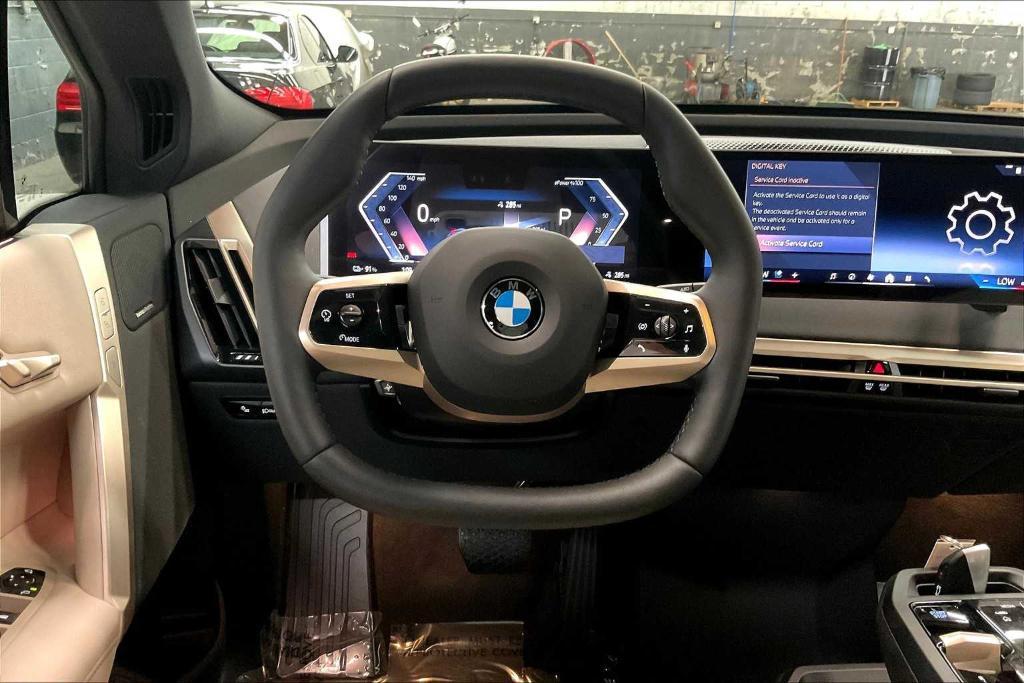 new 2026 BMW iX car, priced at $97,775