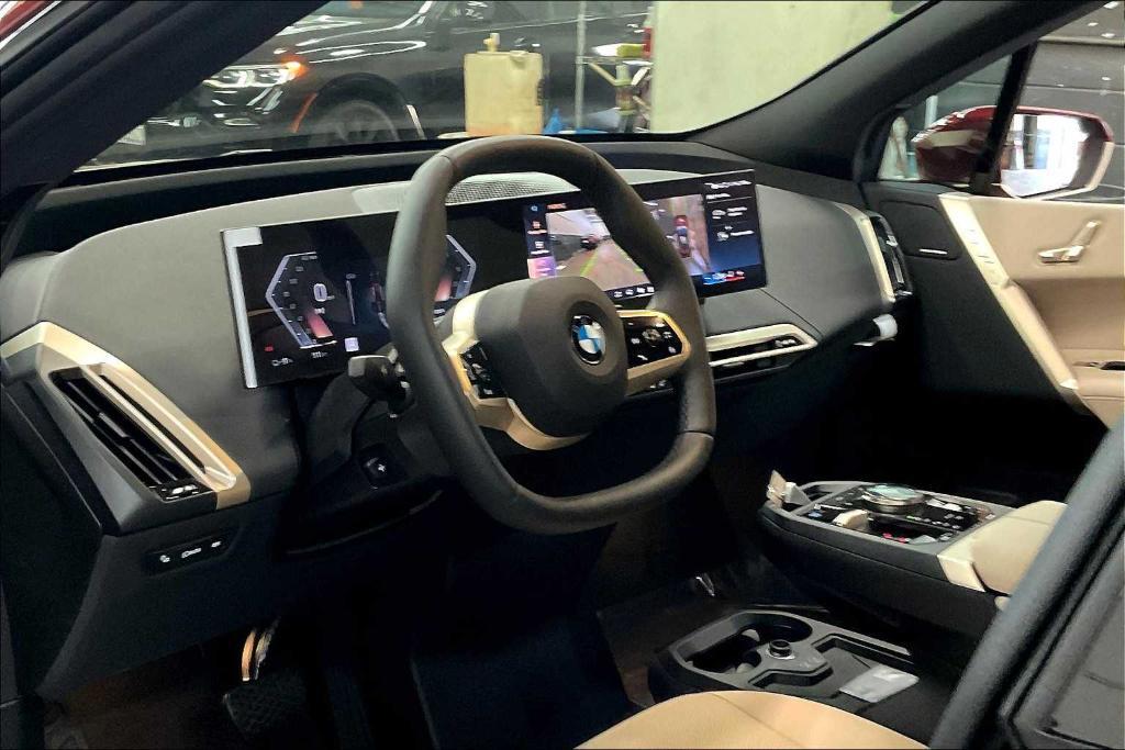 new 2026 BMW iX car, priced at $97,775