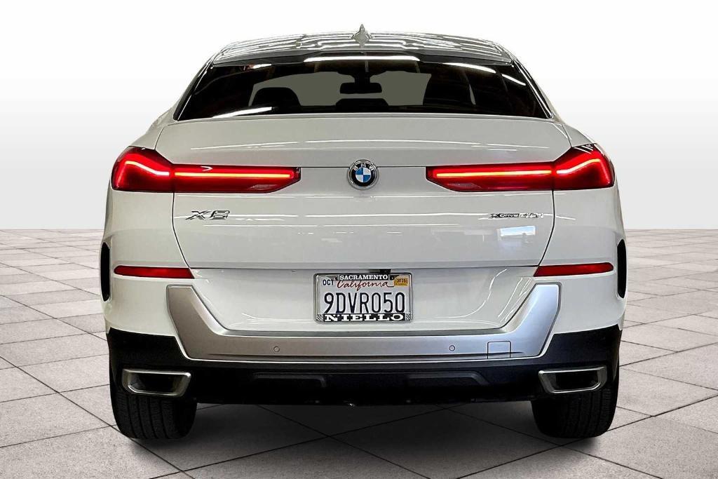 used 2023 BMW X6 car, priced at $54,828