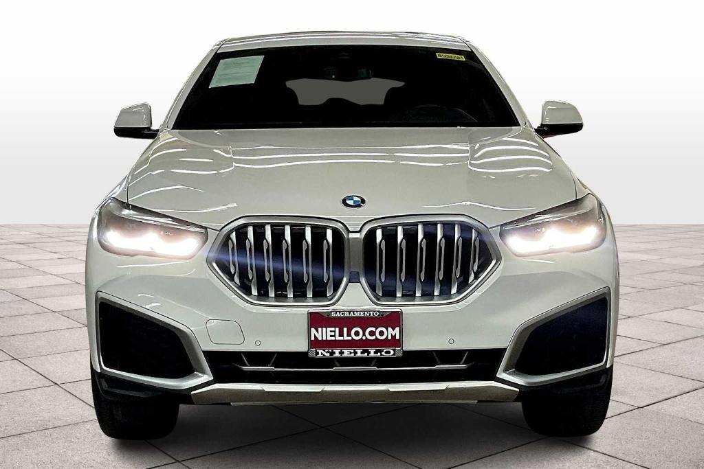 used 2023 BMW X6 car, priced at $54,828