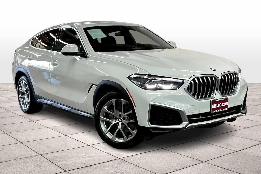 used 2023 BMW X6 car, priced at $54,828