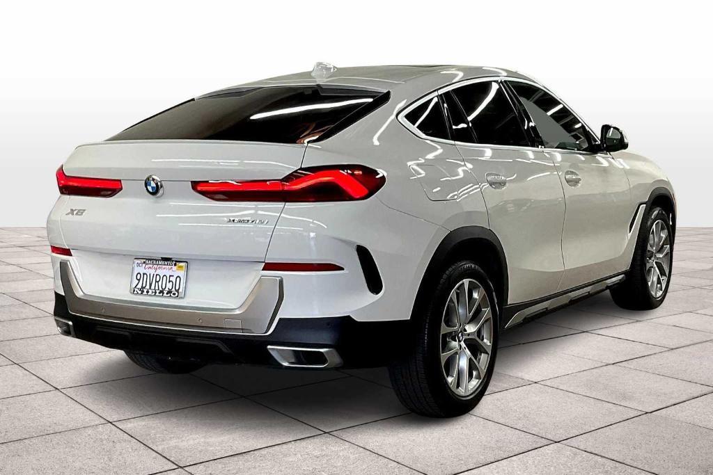 used 2023 BMW X6 car, priced at $54,828