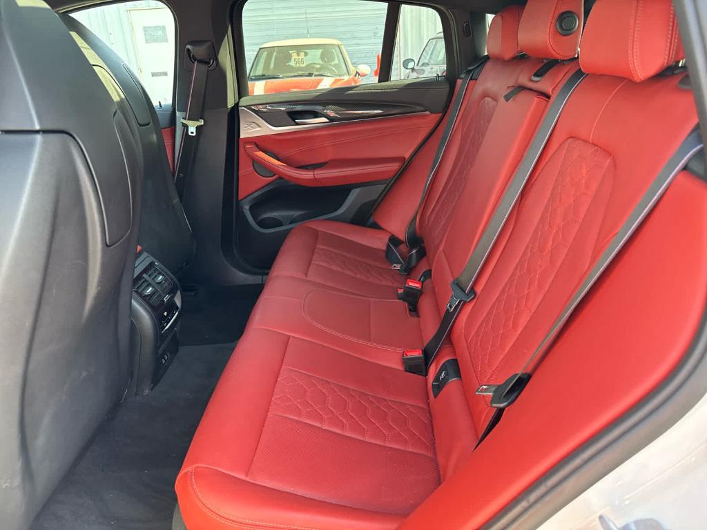 used 2023 BMW X4 M car, priced at $66,156