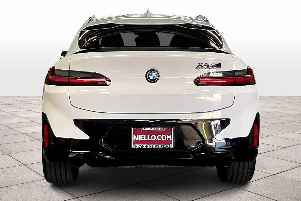 used 2023 BMW X4 M car, priced at $64,494
