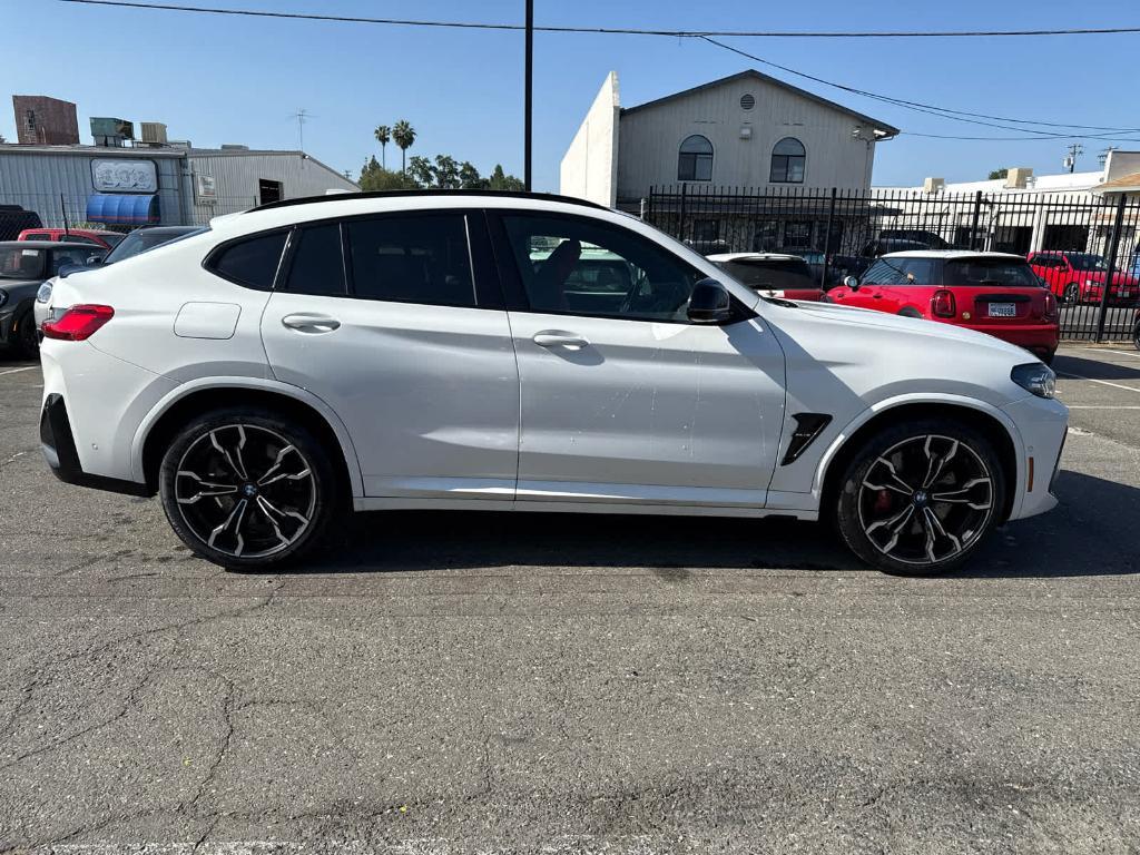 used 2023 BMW X4 M car, priced at $66,156