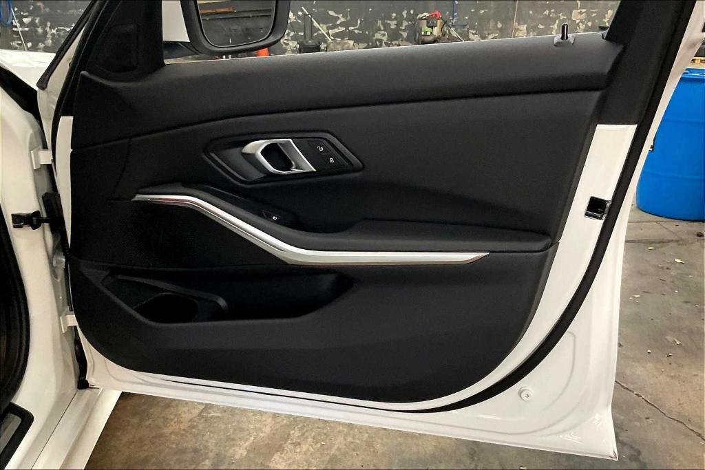 new 2025 BMW 330 car, priced at $50,095