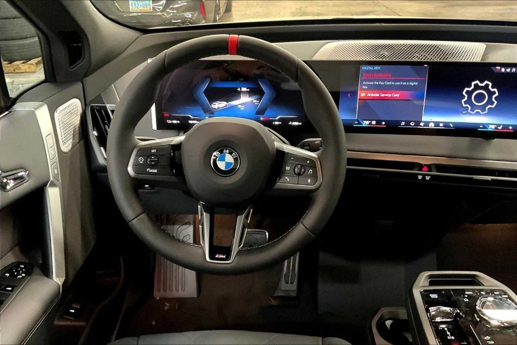 new 2026 BMW iX car, priced at $117,570