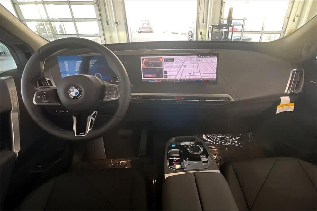 new 2025 BMW iX car, priced at $100,705