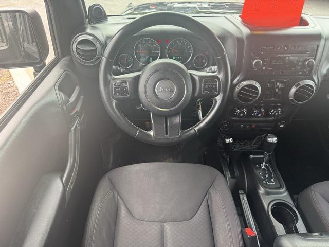 used 2013 Jeep Wrangler Unlimited car, priced at $13,991