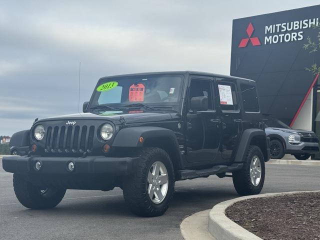 used 2013 Jeep Wrangler Unlimited car, priced at $13,991