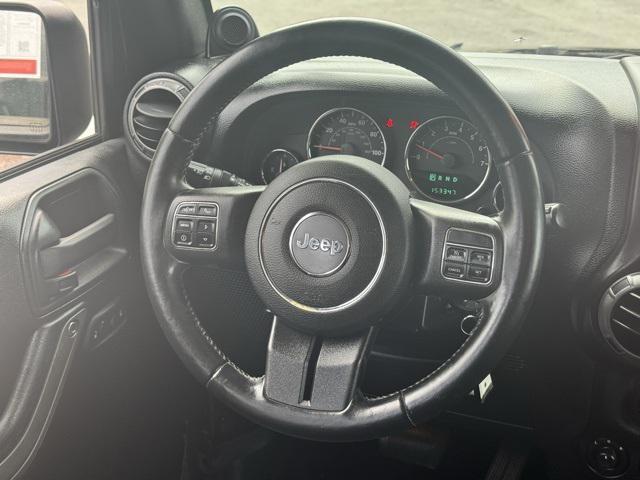 used 2013 Jeep Wrangler Unlimited car, priced at $13,991