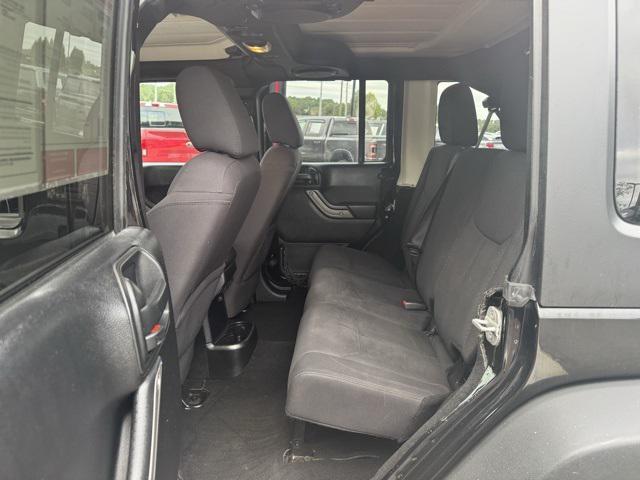 used 2013 Jeep Wrangler Unlimited car, priced at $13,991