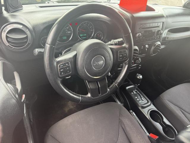 used 2013 Jeep Wrangler Unlimited car, priced at $13,991