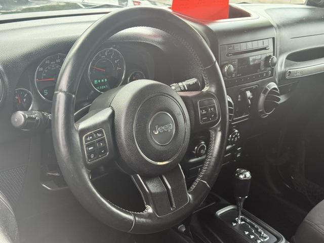 used 2013 Jeep Wrangler Unlimited car, priced at $13,991