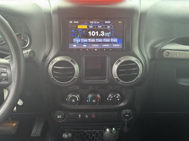 used 2016 Jeep Wrangler Unlimited car, priced at $16,991