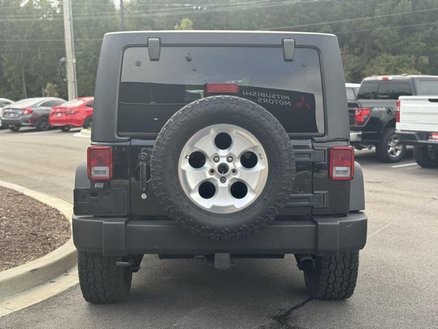 used 2016 Jeep Wrangler Unlimited car, priced at $16,991