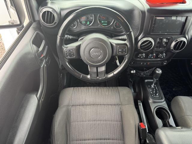 used 2012 Jeep Wrangler Unlimited car, priced at $13,991