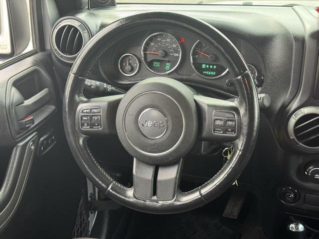 used 2012 Jeep Wrangler Unlimited car, priced at $13,991