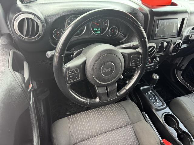 used 2012 Jeep Wrangler Unlimited car, priced at $13,991