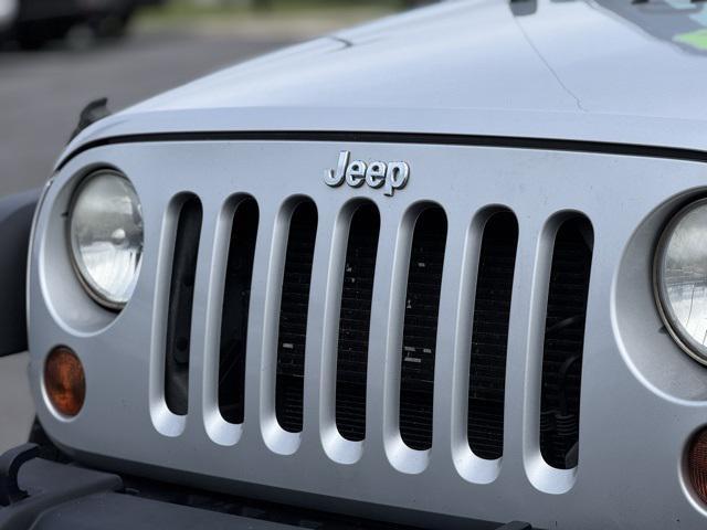 used 2012 Jeep Wrangler Unlimited car, priced at $13,991