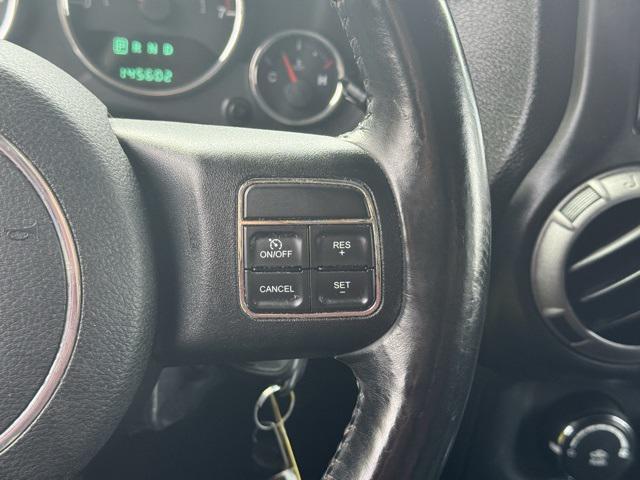 used 2012 Jeep Wrangler Unlimited car, priced at $13,991