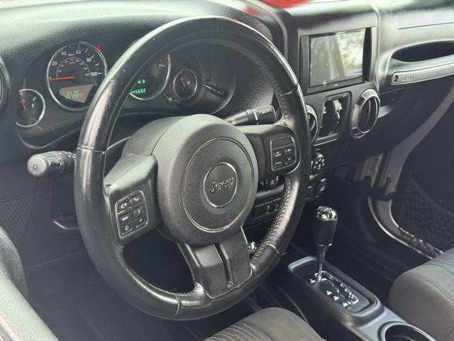 used 2012 Jeep Wrangler Unlimited car, priced at $13,991