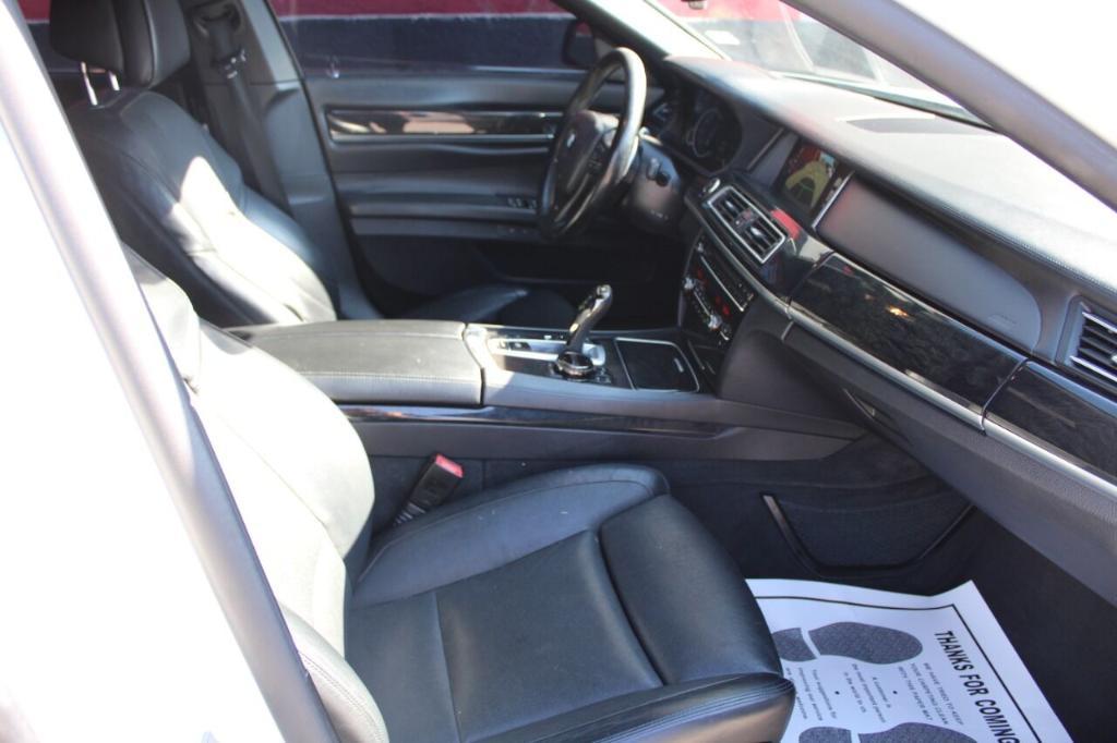 used 2015 BMW 750 car, priced at $18,995