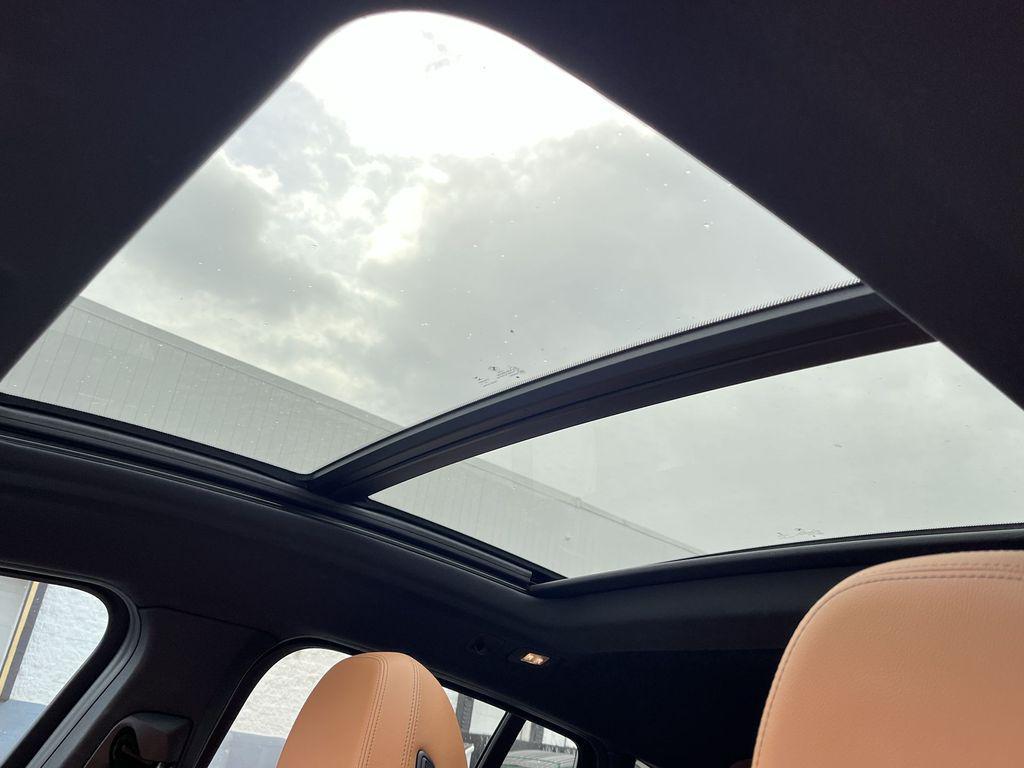 used 2023 BMW X4 car, priced at $47,950