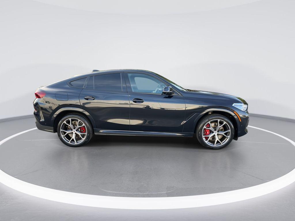 used 2023 BMW X6 car, priced at $68,585