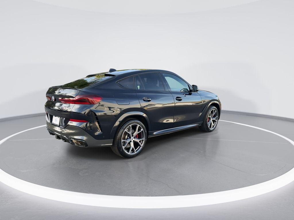 used 2023 BMW X6 car, priced at $68,585