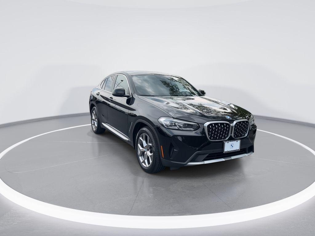 used 2023 BMW X4 car, priced at $39,573