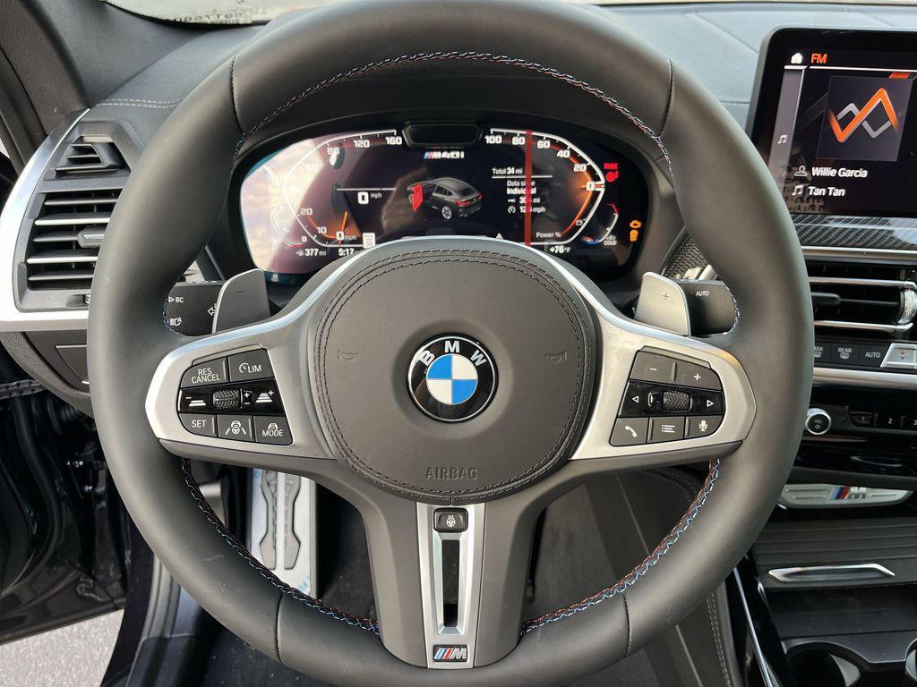 new 2025 BMW X4 car, priced at $74,085