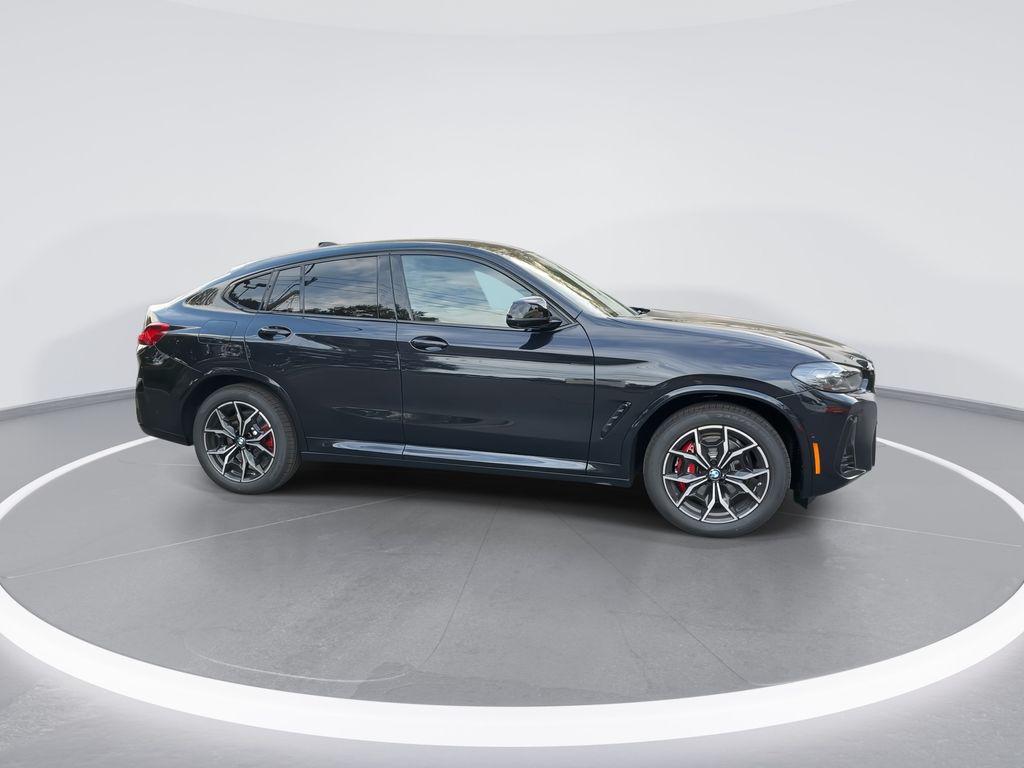 new 2025 BMW X4 car, priced at $74,085