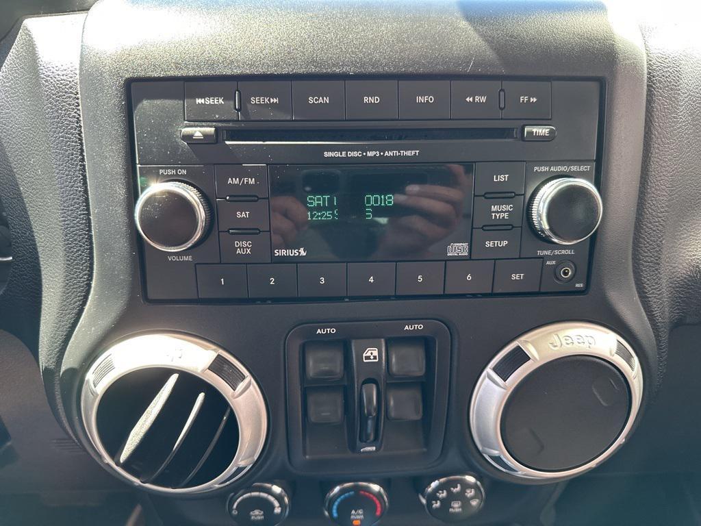 used 2015 Jeep Wrangler Unlimited car, priced at $24,658