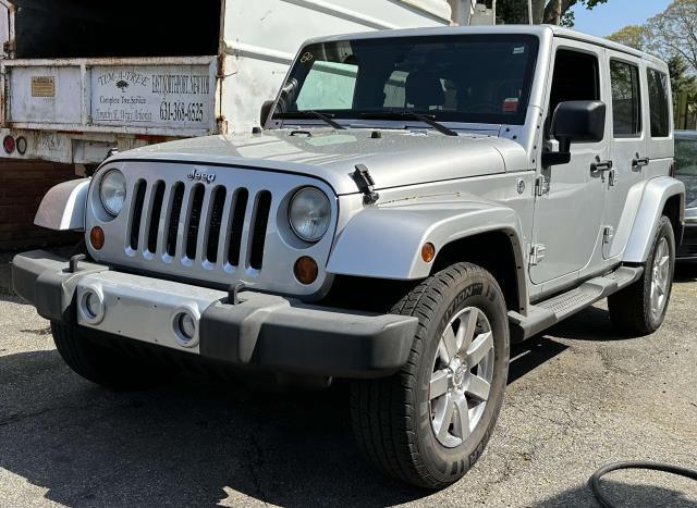 used 2012 Jeep Wrangler Unlimited car, priced at $17,990