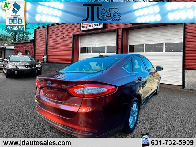 used 2016 Ford Fusion car, priced at $15,990