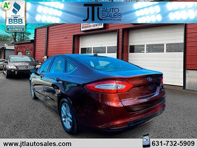 used 2016 Ford Fusion car, priced at $16,290