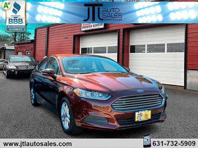 used 2016 Ford Fusion car, priced at $15,990
